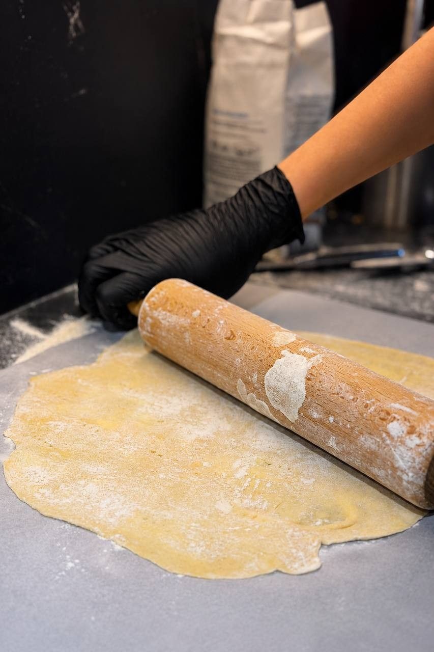 Rolling out dough with a rolling pin