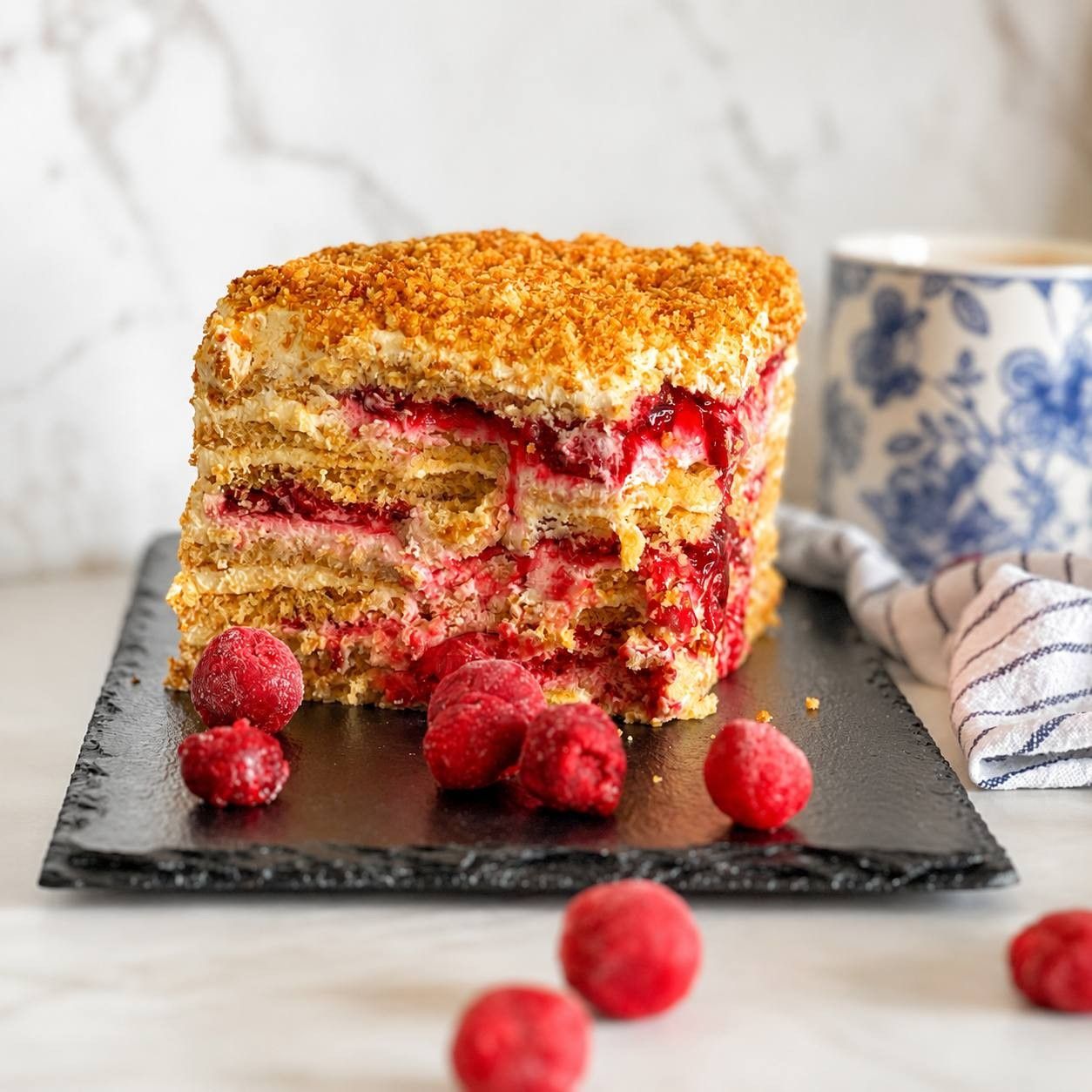 Cake slice with raspberries